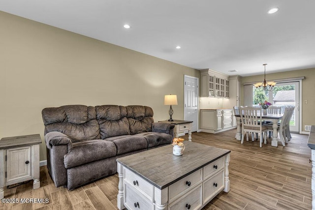 18 Laurel Crest Dr, Howell, NJ 07731 - living room featuring a chandelier, light wood-style flooring, and recessed lighting