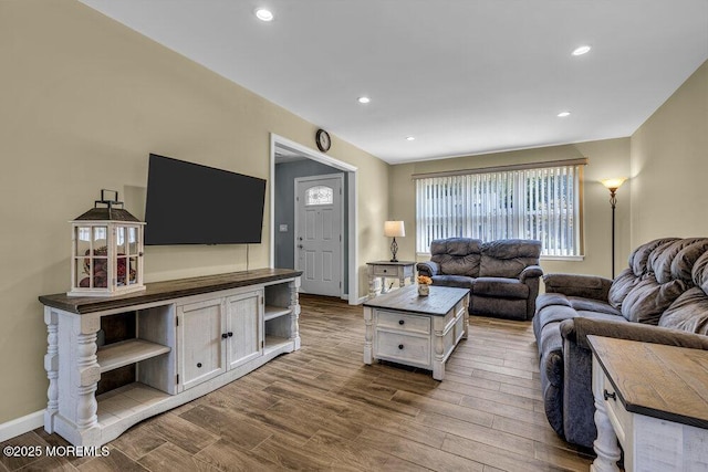 18 Laurel Crest Dr, Howell, NJ 07731 - living area with dark wood-style floors and recessed lighting