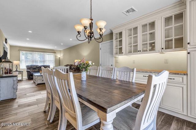18 Laurel Crest Dr, Howell, NJ 07731 - dining area with a chandelier, dark wood-type flooring, and recessed lighting