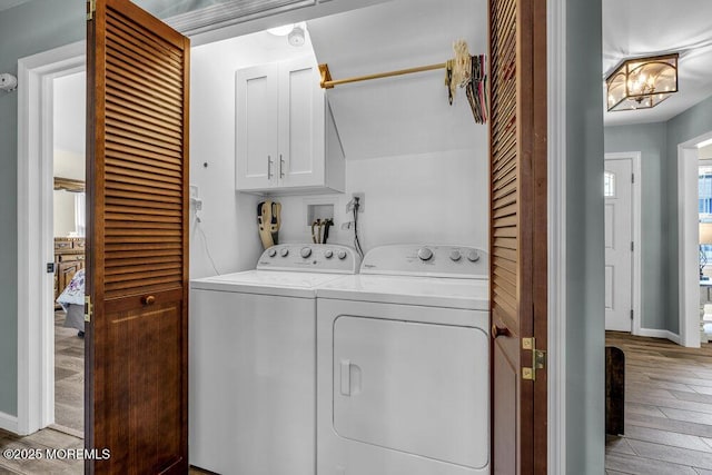 18 Laurel Crest Dr, Howell, NJ 07731 - laundry area with cabinet space, wood finished floors, and washer and clothes dryer