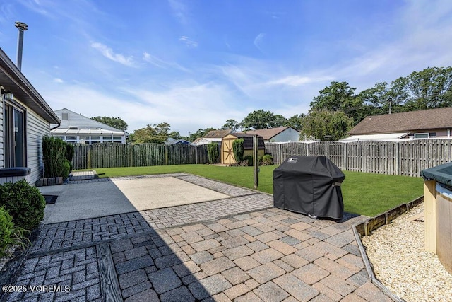 18 Laurel Crest Dr, Howell, NJ 07731 - fenced backyard with a patio area, a grill, and a shed