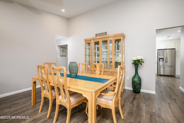 17 Linton Close Close Unit 1000, Freehold, NJ 07728 - dining room featuring dark wood finished floors, a towering ceiling, and recessed lighting