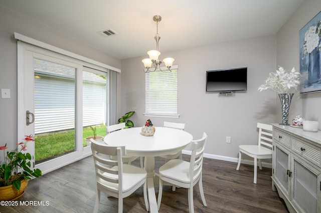 17 Linton Close Close Unit 1000, Freehold, NJ 07728 - dining room with a chandelier and dark wood-style flooring
