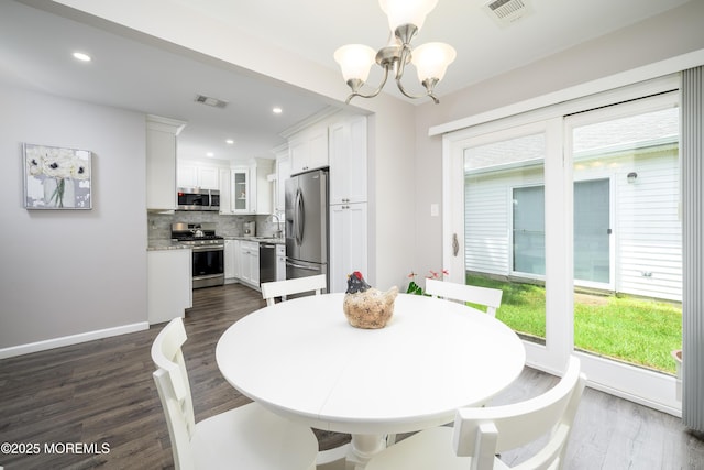 17 Linton Close Close Unit 1000, Freehold, NJ 07728 - dining area featuring a chandelier, dark wood-style flooring, and recessed lighting