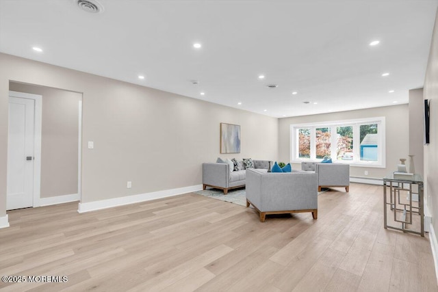 6 Fairfield Rd, Toms River, NJ 08757 - living room with light wood-type flooring, recessed lighting, and a baseboard radiator