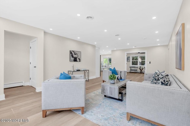6 Fairfield Rd, Toms River, NJ 08757 - living area featuring a baseboard heating unit, light wood-style floors, and recessed lighting