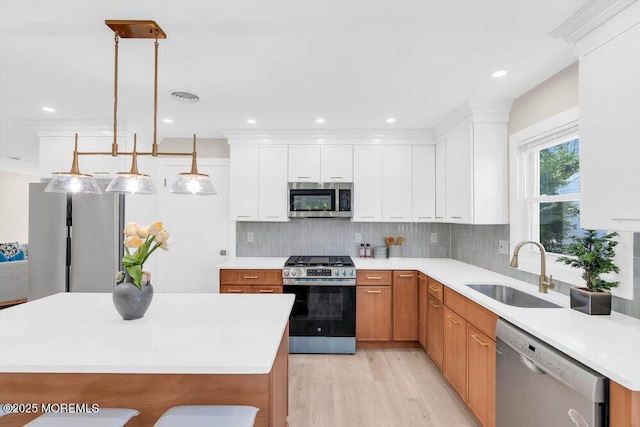 6 Fairfield Rd, Toms River, NJ 08757 - kitchen with appliances with stainless steel finishes, light wood-style flooring, light countertops, and recessed lighting