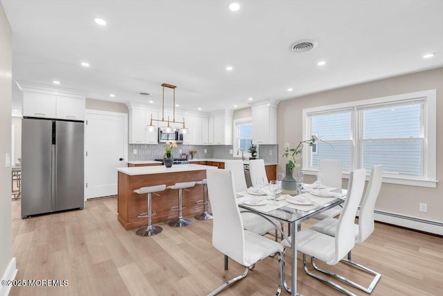 6 Fairfield Rd, Toms River, NJ 08757 - dining area with light wood finished floors, recessed lighting, and baseboard heating