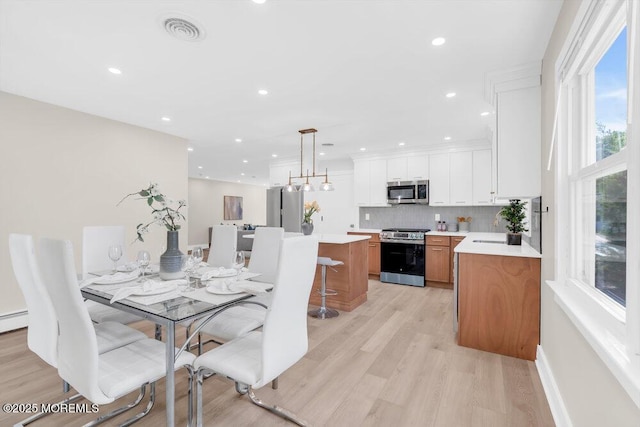 6 Fairfield Rd, Toms River, NJ 08757 - dining space with light wood-type flooring and recessed lighting