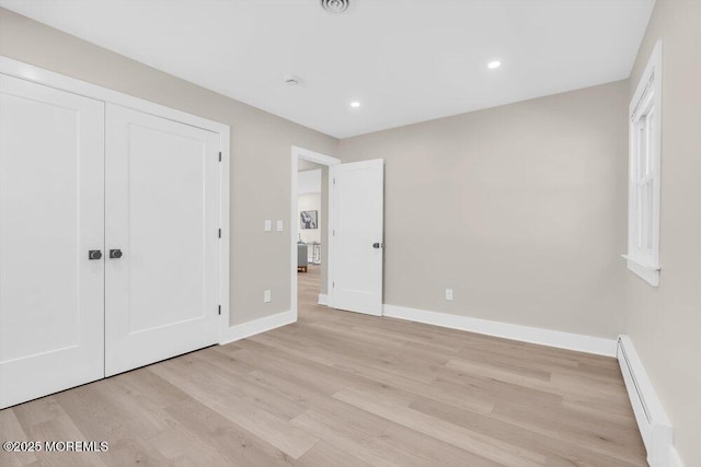 6 Fairfield Rd, Toms River, NJ 08757 - unfurnished bedroom with baseboard heating, light wood-type flooring, a closet, and recessed lighting