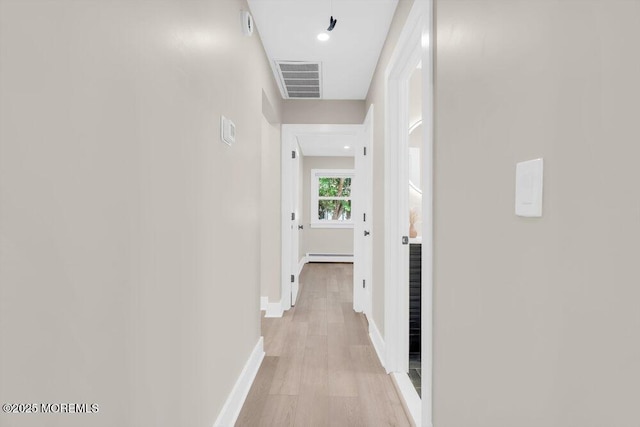 6 Fairfield Rd, Toms River, NJ 08757 - hall featuring a baseboard heating unit and light wood finished floors