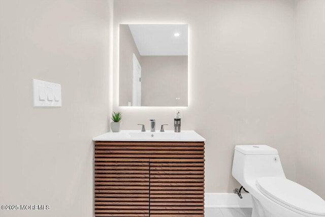 6 Fairfield Rd, Toms River, NJ 08757 - half bathroom with vanity and tile patterned flooring