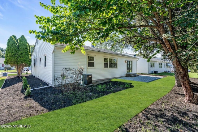 6 Fairfield Rd, Toms River, NJ 08757 - rear view of property with a yard and a patio area