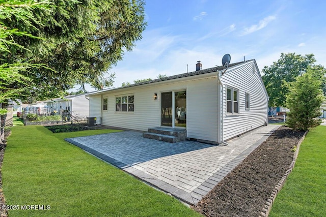 6 Fairfield Rd, Toms River, NJ 08757 - back of property with a patio, a yard, and a chimney