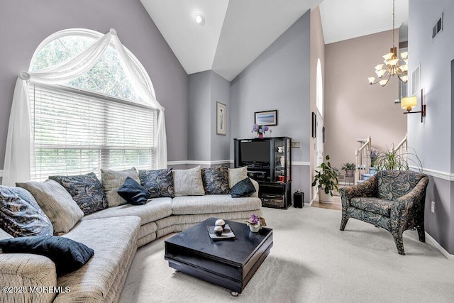 32 Tilton Rd, Brick, NJ 08723 - carpeted living room with a chandelier and high vaulted ceiling
