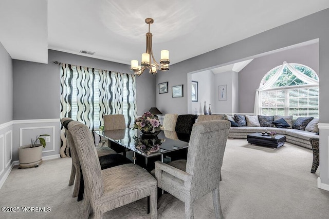 32 Tilton Rd, Brick, NJ 08723 - dining space with light colored carpet and a chandelier