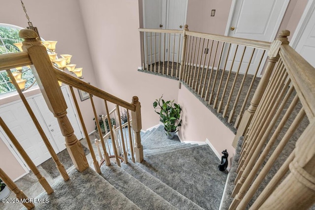 32 Tilton Rd, Brick, NJ 08723 - staircase featuring a chandelier