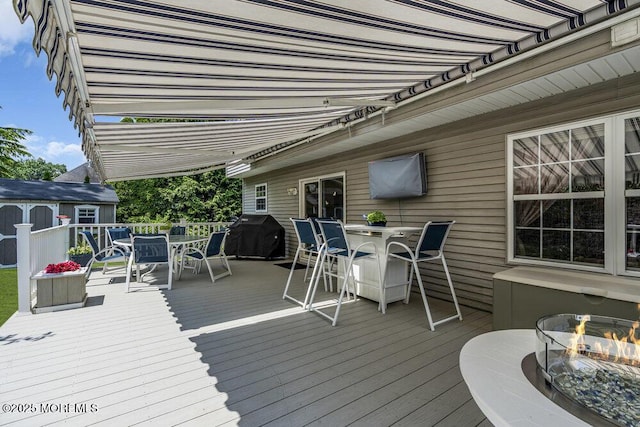 32 Tilton Rd, Brick, NJ 08723 - wooden terrace featuring outdoor dining area, area for grilling, and a shed