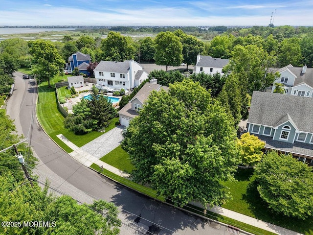 32 Tilton Rd, Brick, NJ 08723 - aerial perspective of suburban area featuring a pool and a nearby body of water