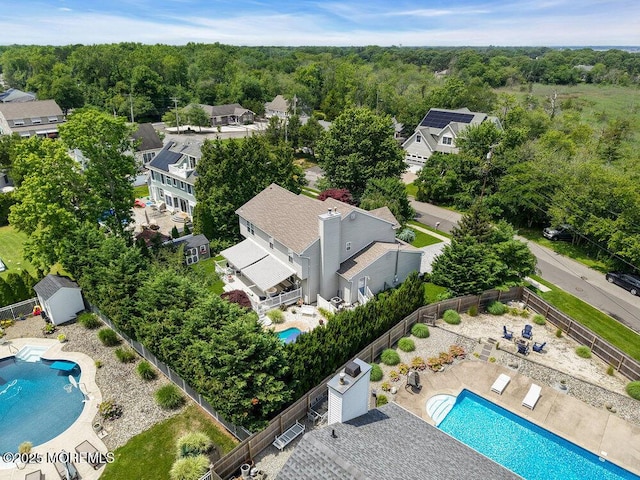 32 Tilton Rd, Brick, NJ 08723 - bird's eye view of a pool and a forest
