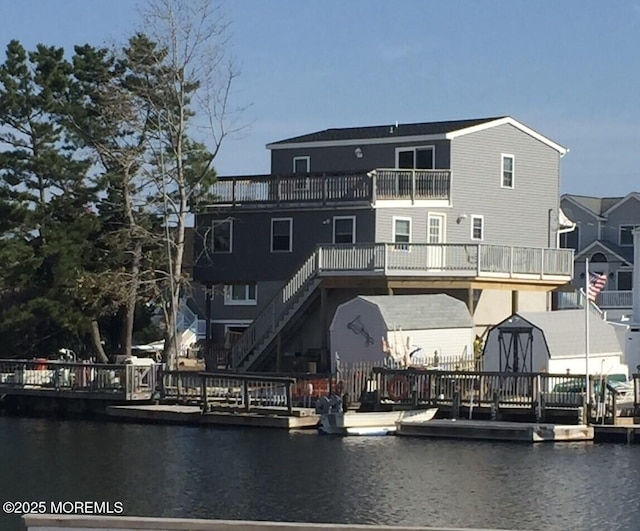 27 Robert Dr, Beach Haven West, NJ 08050 - dock area featuring a water view and a balcony