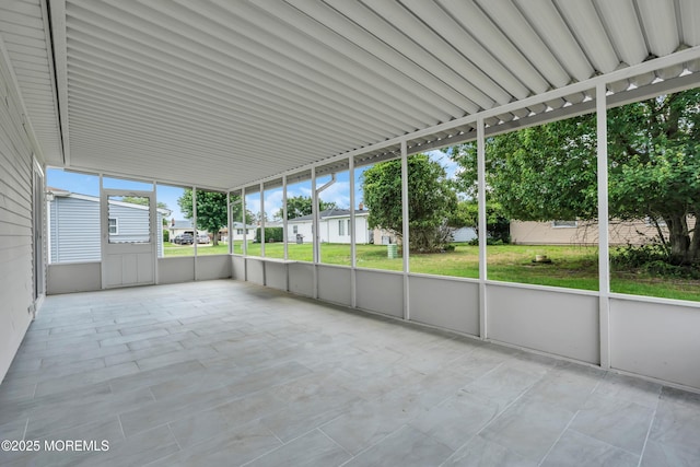 171 Biabou Dr, Toms River, NJ 08757 - unfurnished sunroom featuring a residential view