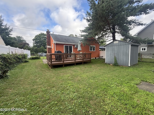 70 Bray Ave, North Middletown, NJ 07748 - back of property with a deck, a shed, a chimney, and roof with shingles