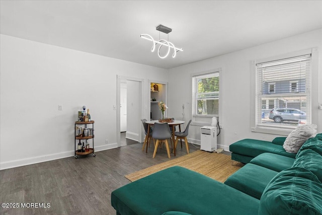 1015 Mattison Ave, Asbury Park, NJ 07712 - living room featuring wood finished floors and a chandelier