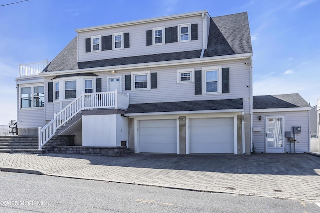 2400 Ocean Front, Lavallette, NJ 08735 - view of front of house featuring decorative driveway, a garage, and roof with shingles
