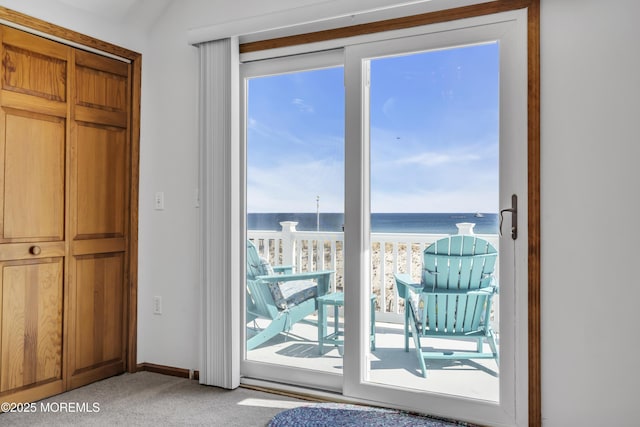 2400 Ocean Front, Lavallette, NJ 08735 - doorway to outside with a water view and light carpet