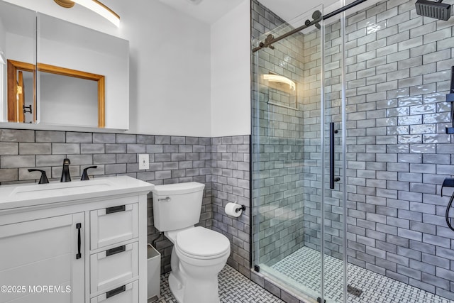 2400 Ocean Front, Lavallette, NJ 08735 - full bathroom featuring tile walls, vanity, a stall shower, tile patterned flooring, and a wainscoted wall