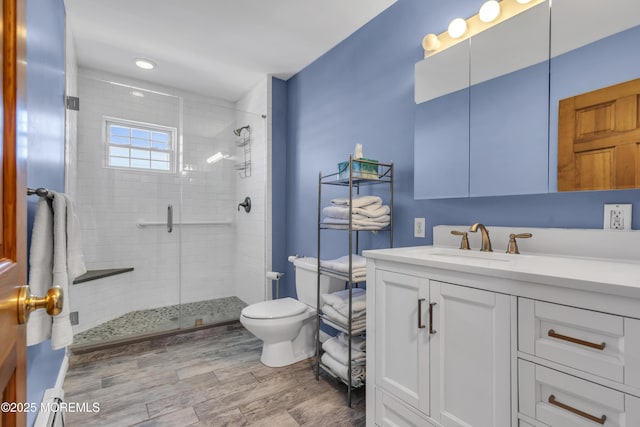 2400 Ocean Front, Lavallette, NJ 08735 - bathroom featuring vanity, a shower stall, and wood finished floors