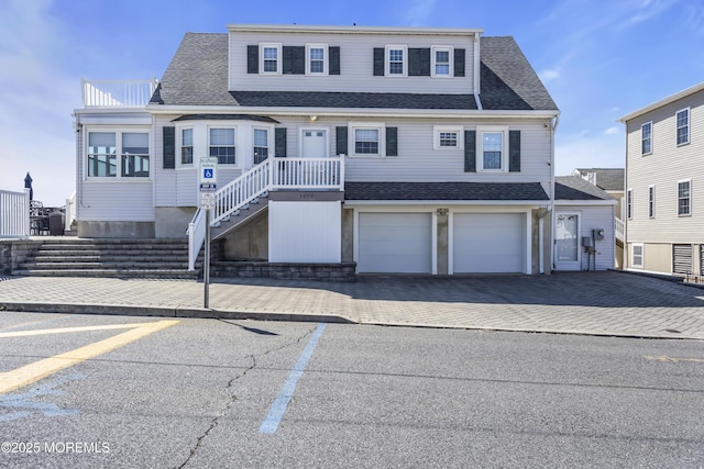 2400 Ocean Front, Lavallette, NJ 08735 - view of front of home with a garage and a shingled roof