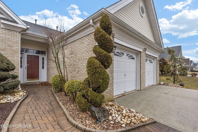 14 Barton Creek Rd, Jackson, NJ 08527 - view of side of property with asphalt driveway and brick siding