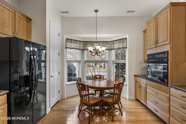 14 Barton Creek Rd, Jackson, NJ 08527 - dining space featuring light wood-type flooring and a chandelier