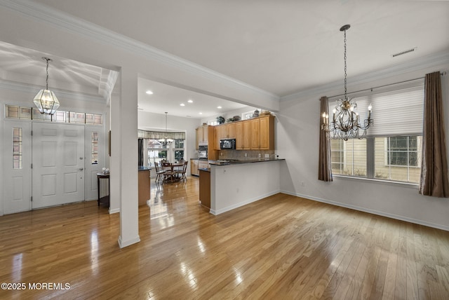 14 Barton Creek Rd, Jackson, NJ 08527 - kitchen featuring a chandelier, black appliances, ornamental molding, light wood-style flooring, and recessed lighting