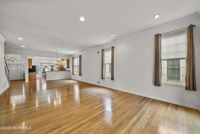 14 Barton Creek Rd, Jackson, NJ 08527 - unfurnished living room featuring a chandelier, ornamental molding, light wood-type flooring, and recessed lighting