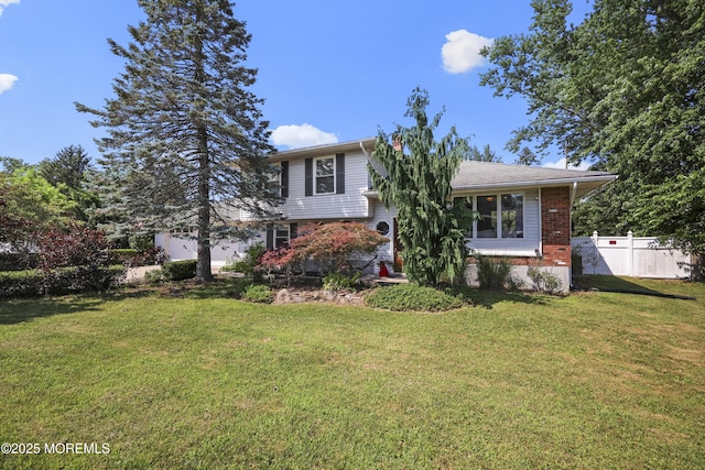 41 Alan Ter, Howell, NJ 07731 - split level home with brick siding and a garage