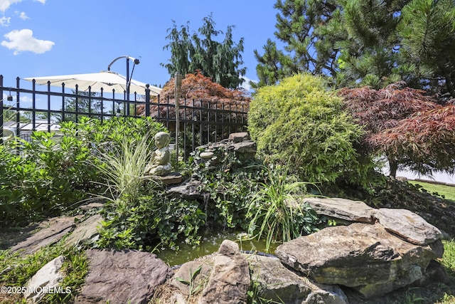 41 Alan Ter, Howell, NJ 07731 - view of yard featuring a small pond