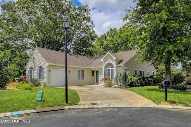 6 Thatcher Ct, Jackson, NJ 08527 - view of front of house featuring an attached garage, a front yard, concrete driveway, and a shingled roof