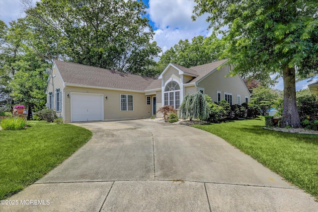 6 Thatcher Ct, Jackson, NJ 08527 - view of front of property featuring an attached garage, concrete driveway, a front yard, and a shingled roof
