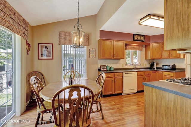 6 Thatcher Ct, Jackson, NJ 08527 - kitchen featuring dishwasher, light wood finished floors, a chandelier, vaulted ceiling, and tasteful backsplash