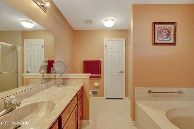 6 Thatcher Ct, Jackson, NJ 08527 - bathroom with vanity, a garden tub, and a shower stall