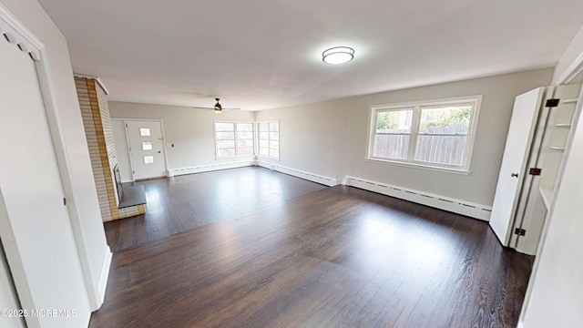 574 Main St, Sayreville, NJ 08872 - spare room with a baseboard heating unit, dark wood-style flooring, a ceiling fan, and baseboard heating