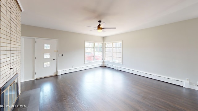 574 Main St, Sayreville, NJ 08872 - unfurnished living room with ceiling fan, dark wood-type flooring, a fireplace, and baseboard heating