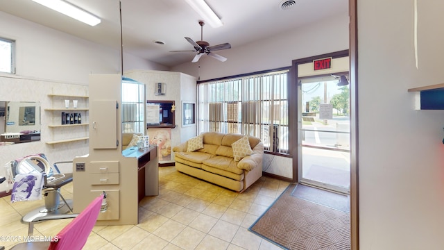 574 Main St, Sayreville, NJ 08872 - living room with light tile patterned flooring, ceiling fan, and vaulted ceiling