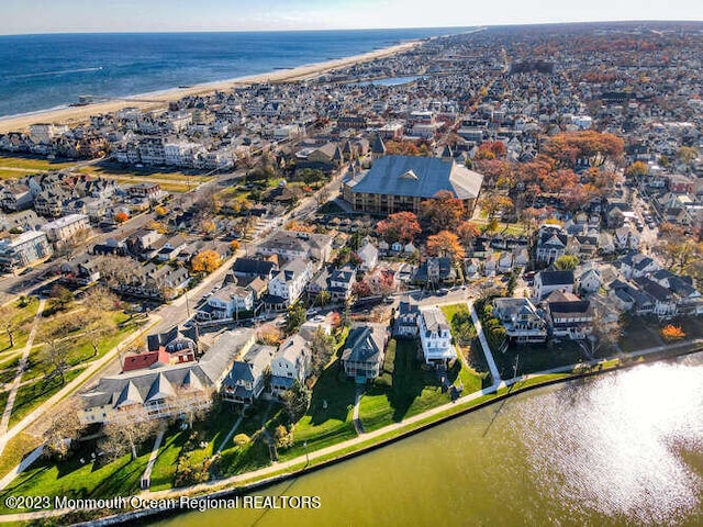 63 Asbury Ave, Ocean Grove, NJ 07756 - aerial overview of property's location featuring a large body of water and nearby suburban area