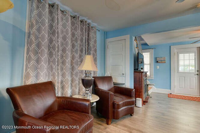 63 Asbury Ave, Ocean Grove, NJ 07756 - living area with wood finished floors and baseboards