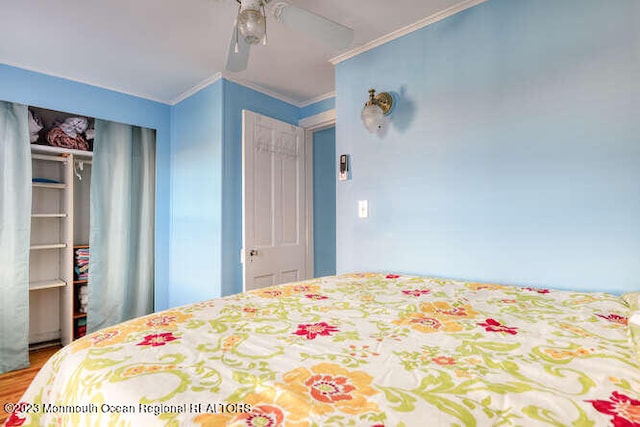 63 Asbury Ave, Ocean Grove, NJ 07756 - bedroom with wood finished floors, a closet, crown molding, and ceiling fan