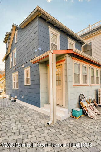 63 Asbury Ave, Ocean Grove, NJ 07756 - back of house with a patio area